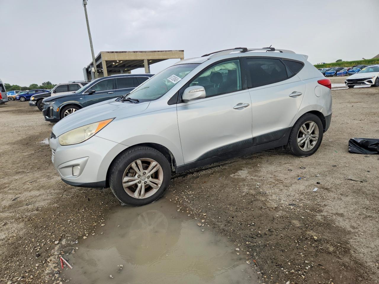 2013 Hyundai Tucson GLS, VIN KM8JU3AC7DU652773 — Rear end
