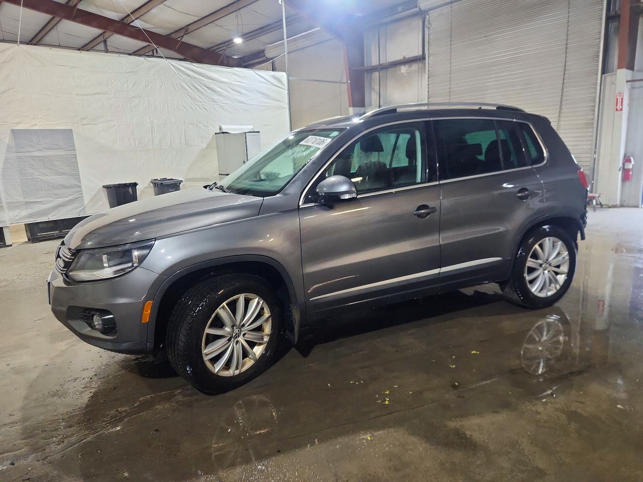 2013 Volkswagen Tiguan S, VIN WVGBV3AX4DW612515 — Rear end