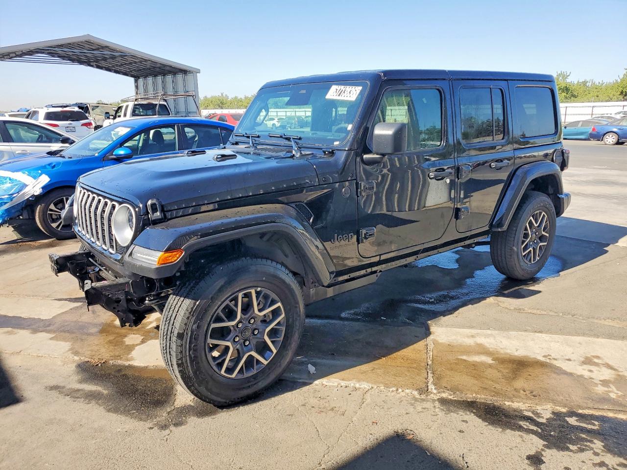 2026 Jeep Wrangler Sahara, VIN 1C4PJXEG2TW315233 — Front end