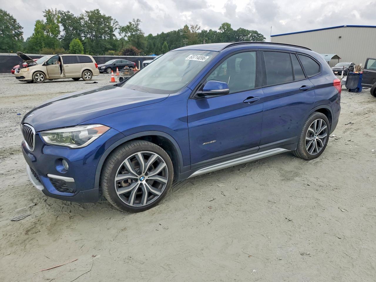 2017 BMW X1 sDrive28i, VIN WBXHU7C30H5H36432 — Мелкие вмятины и царапины
