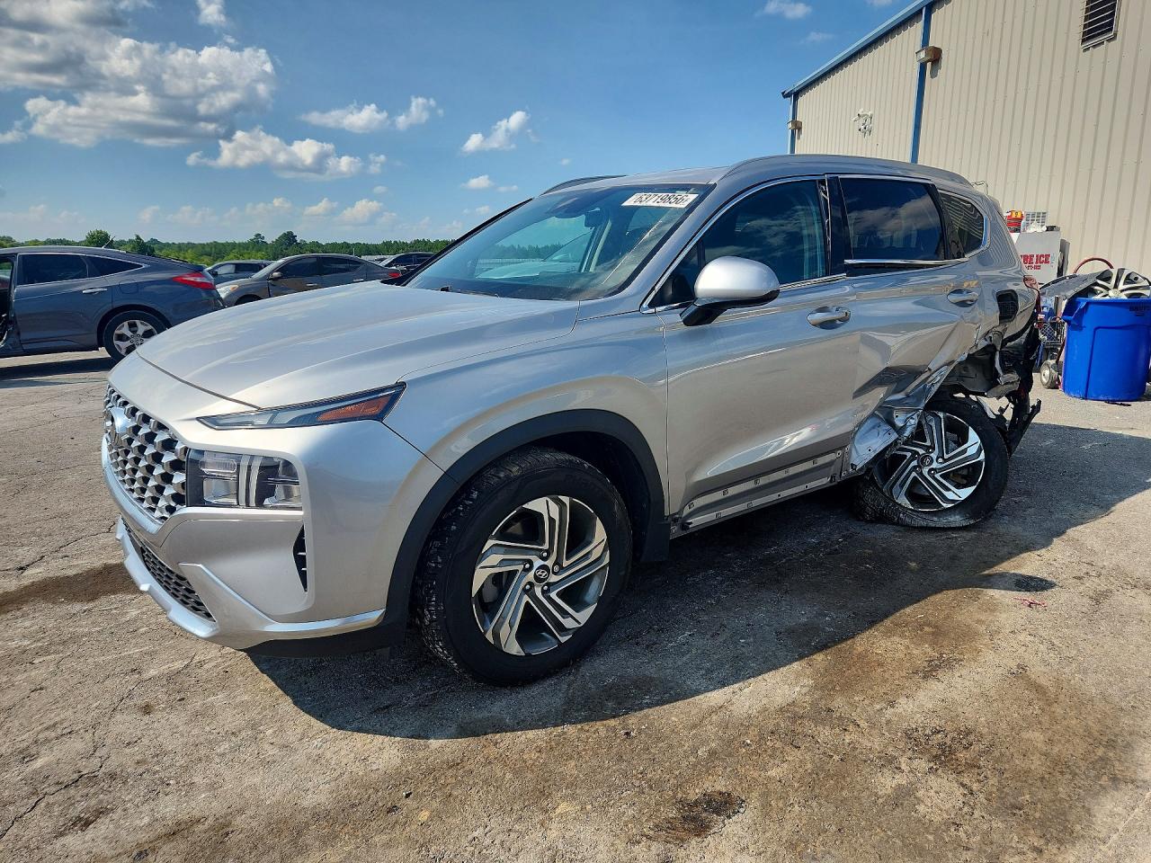 2021 Hyundai Santa Fe SEL, VIN 5NMS24AJ9MH326077 — Side