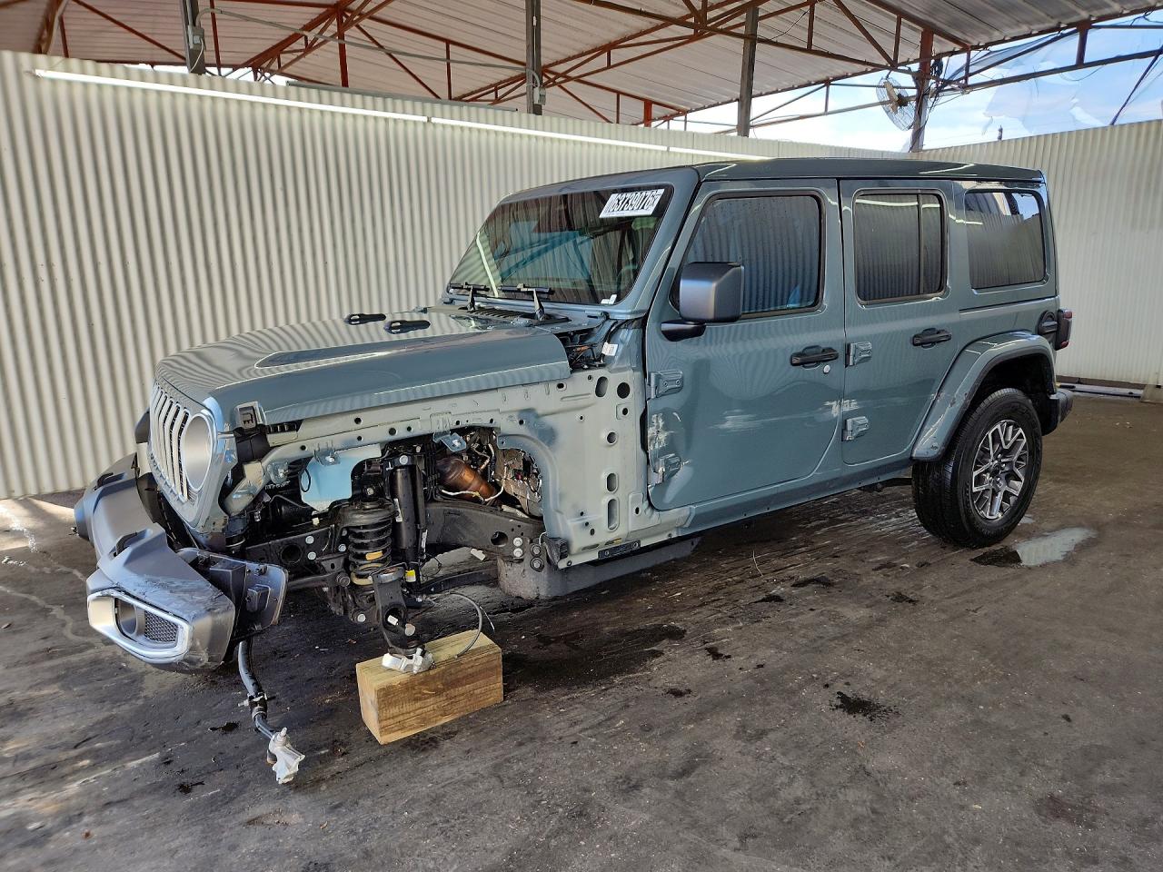 2026 Jeep Wrangler Sahara, VIN 1C4PJXEG7TW254767 — Front end