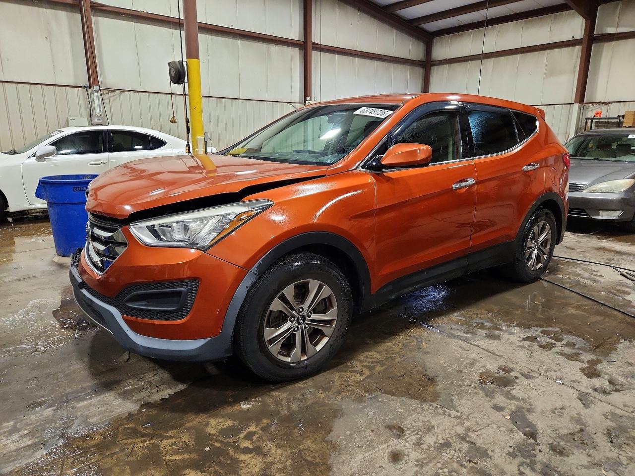 2015 Hyundai Santa Fe, VIN 5XYZTDLB7FG301645 — Front end