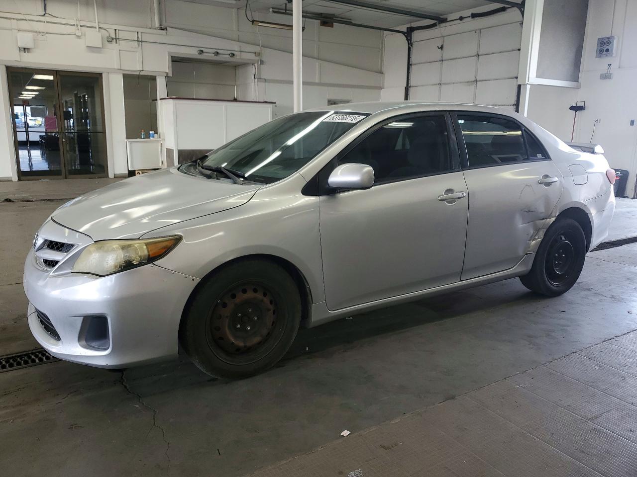 2012 Toyota Corolla LE, VIN 2T1BU4EE6CC874999 — Side