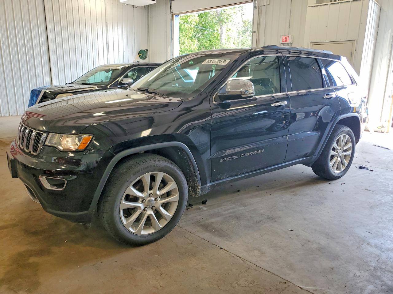 2017 Jeep Grand Cherokee Limited, VIN 1C4RJFBGXHC706338 — Бок