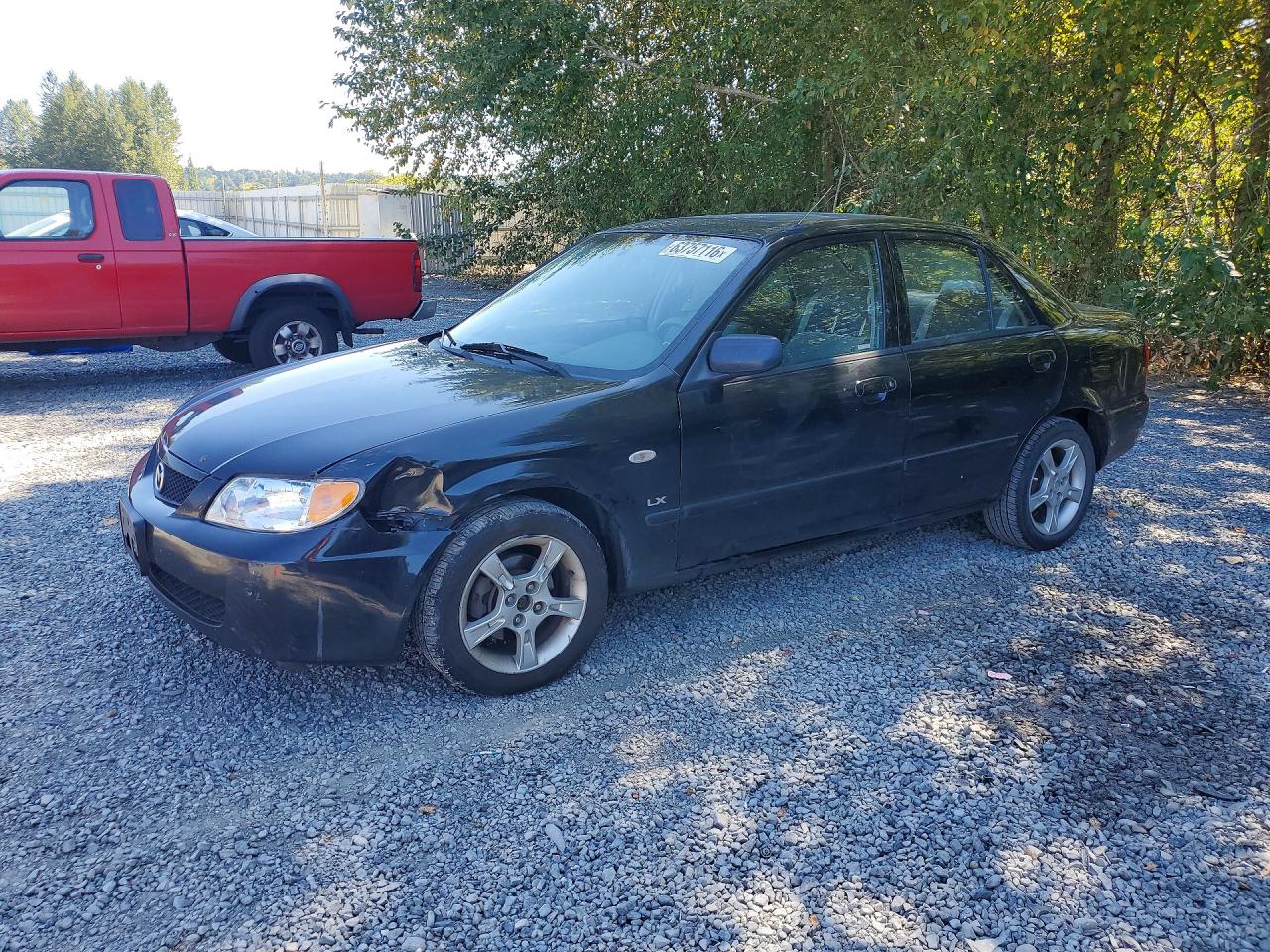 2003 Mazda Protege DX, VIN JM1BJ225930178553 — Front end