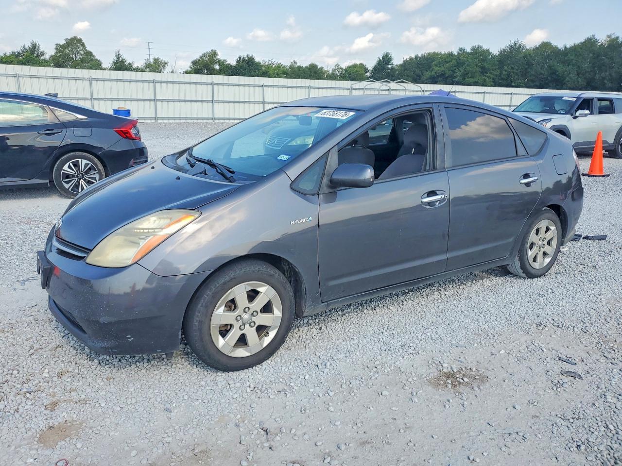 2007 Toyota Prius, VIN JTDKB20U273291482 — Бок