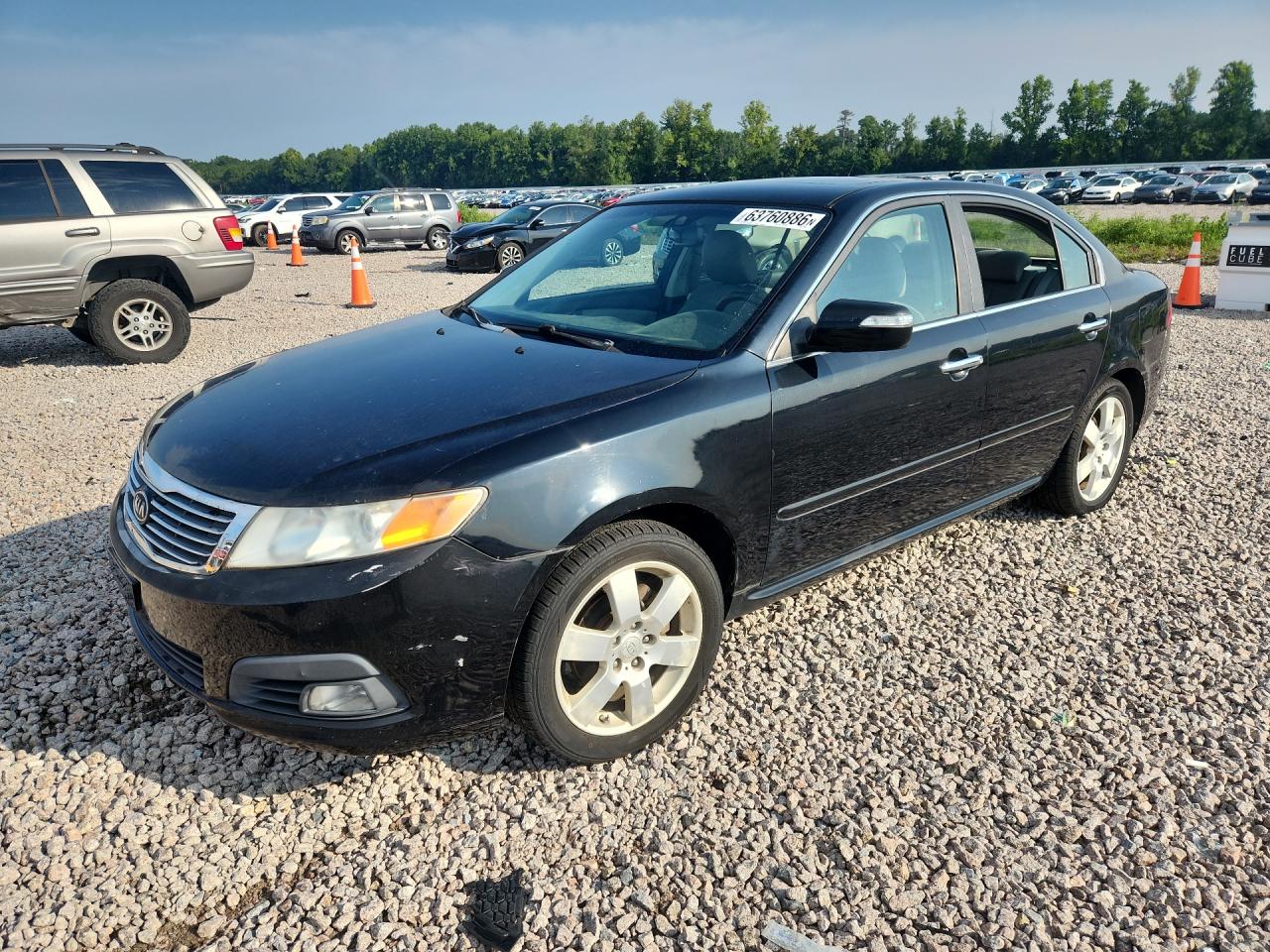 2009 Kia Optima LX, VIN KNAGE228995311678 — Бок