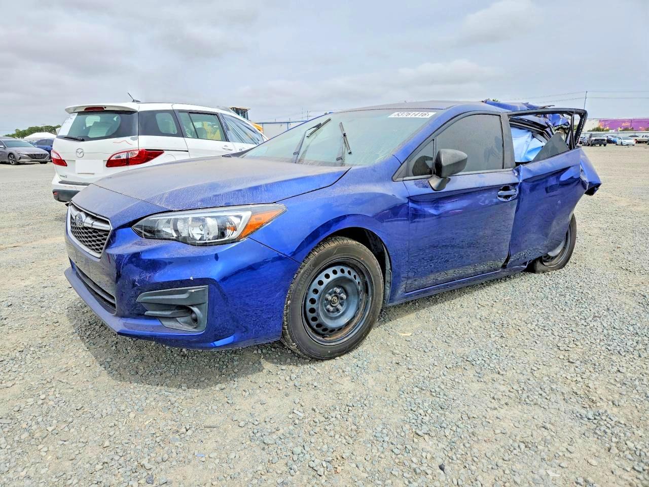2018 Subaru Impreza, VIN 4S3GTAA62J3716834 — Rear end