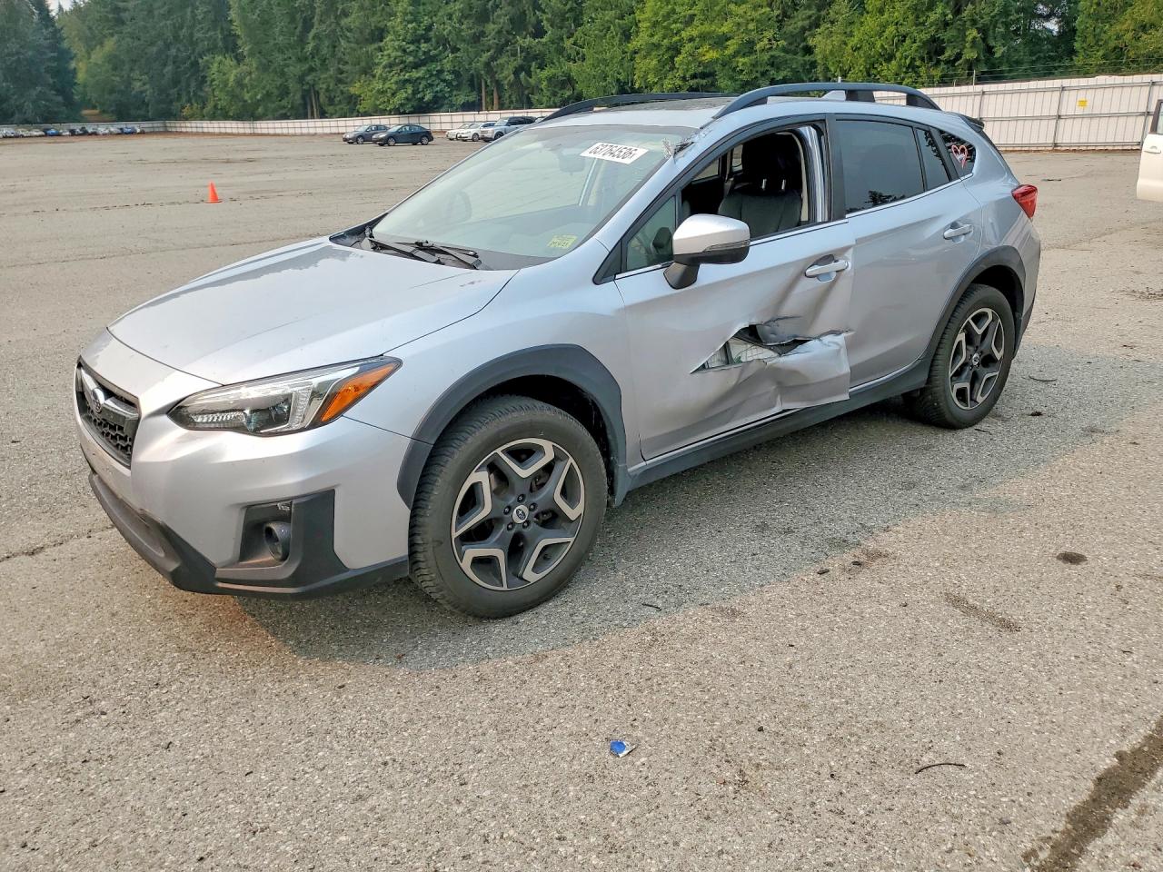 2018 Subaru Crosstrek Limited, VIN JF2GTALC3JH260799 — Side
