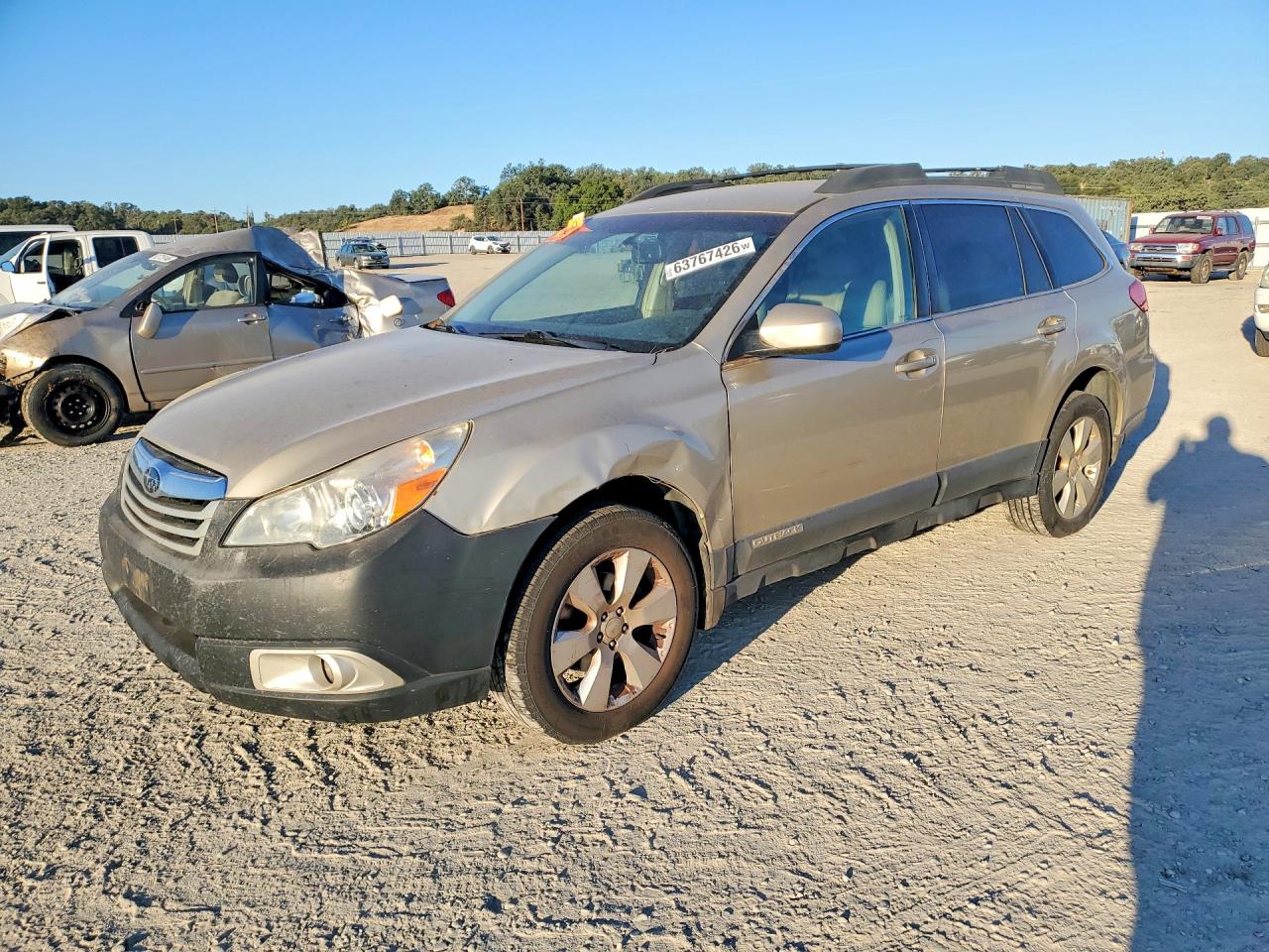 2010 Subaru Outback Premium All-Weather Anniversary, VIN 4S4BRBCC9A3376661 — Front end