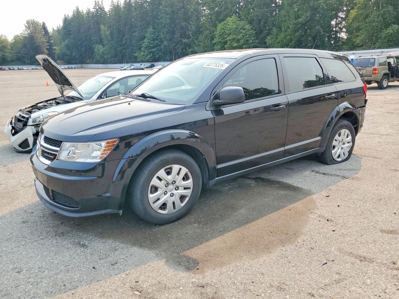 2014 Dodge Journey American Value, VIN 3C4PDCAB6ET165601 — Rear end
