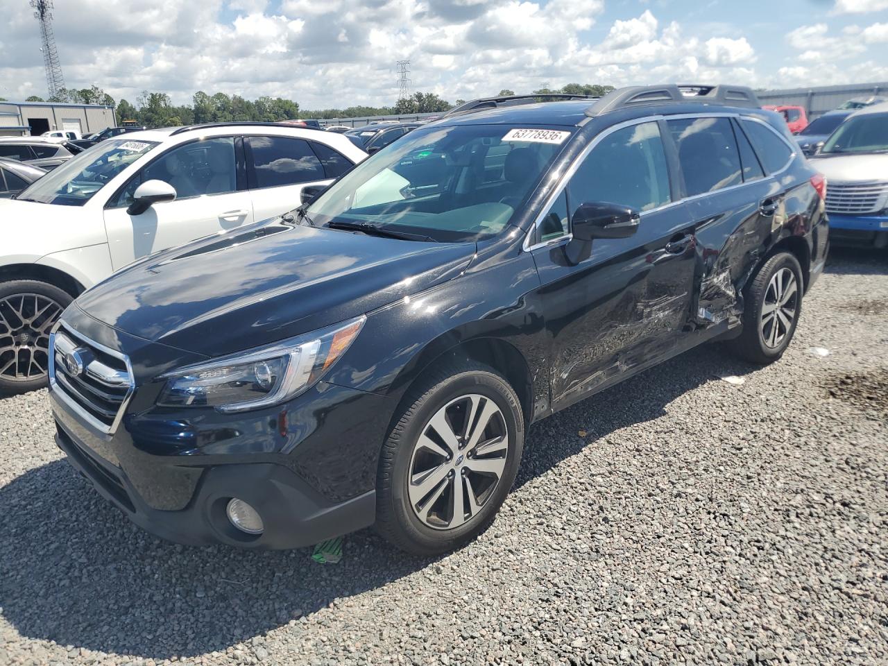 2019 Subaru Outback Limited, VIN 4S4BSANC5K3349065 — Бок