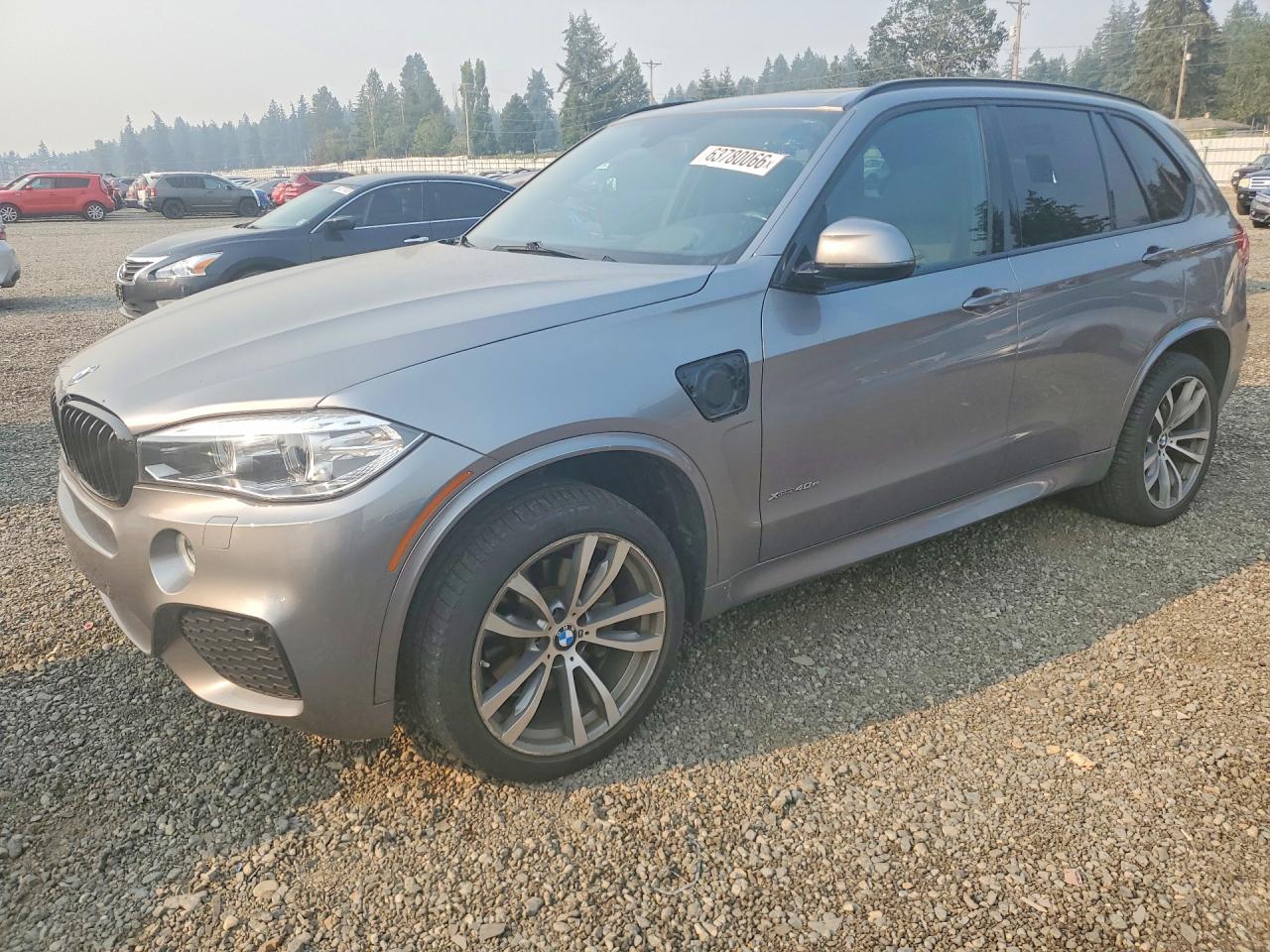 2016 BMW X5 xDrive40e, VIN 5UXKT0C51G0S79457 — Side