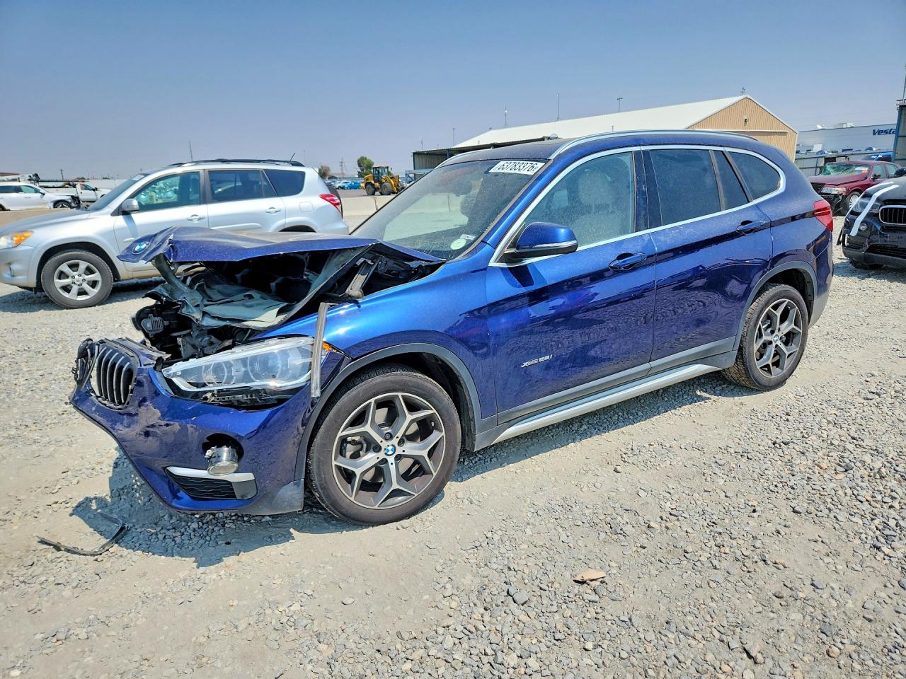 2017 BMW X1 xDrive28i, VIN WBXHT3C35H5F82411 — Front end