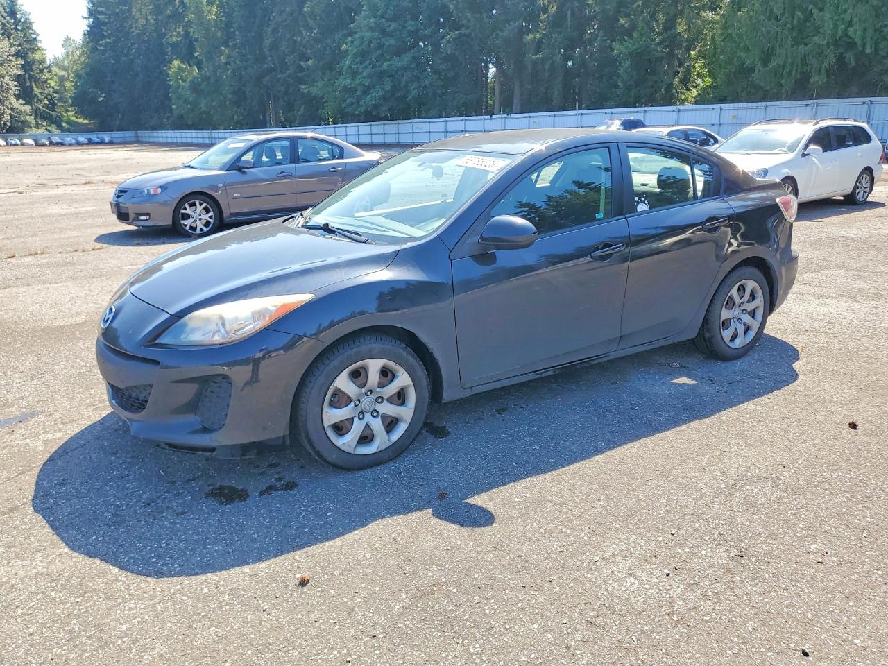 2012 Mazda 3 i Sport, VIN JM1BL1UG6C1562609 — Minor dents and scratches
