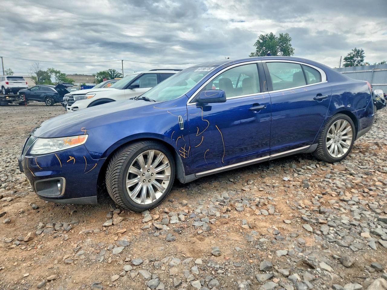 2011 Lincoln MKS, VIN 1LNHL9ER7BG603734 — Minor dents and scratches