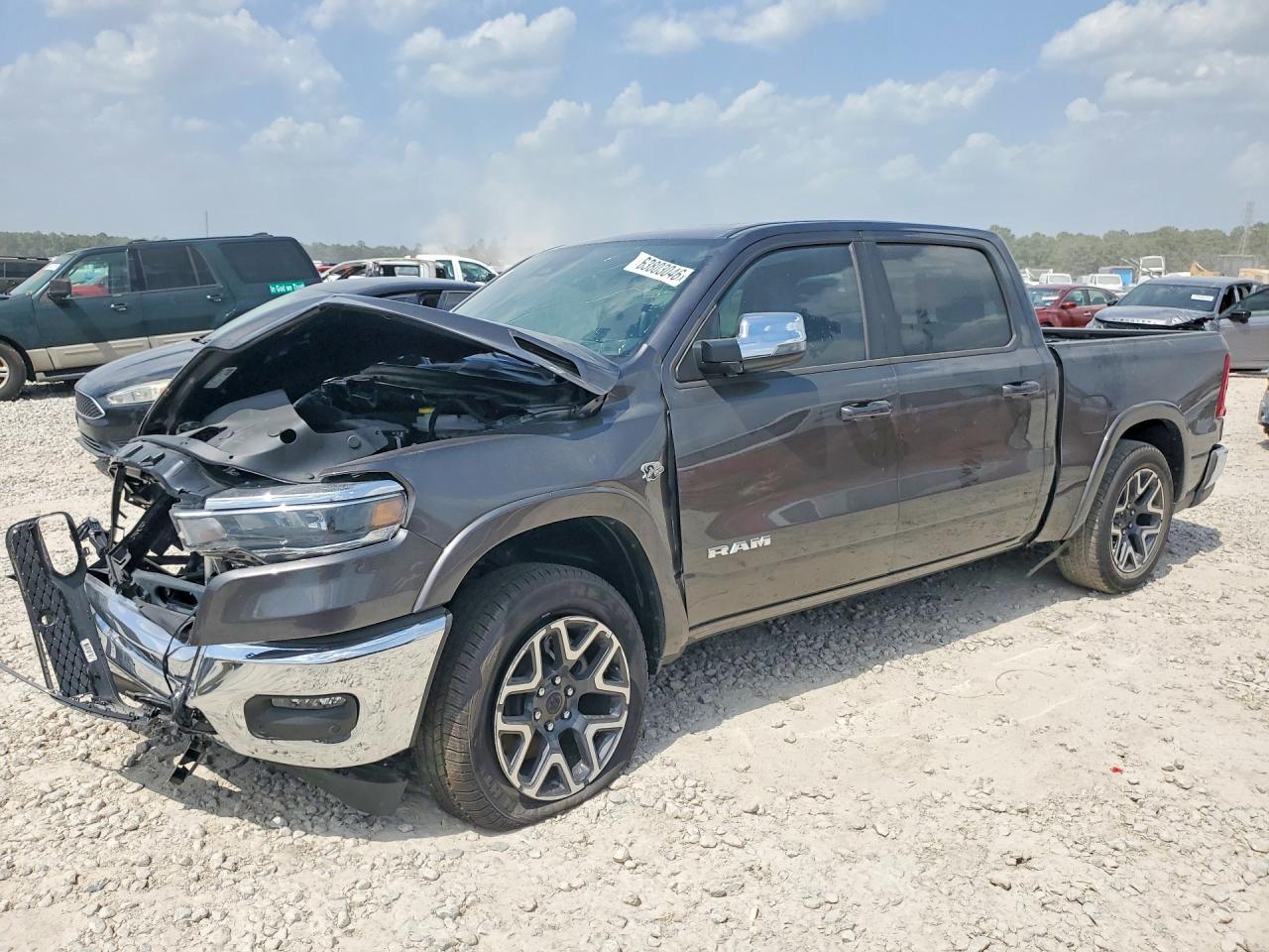 2026 Ram 1500 Laramie, VIN 1C6SRFJT1TN290225 — По всему кузову