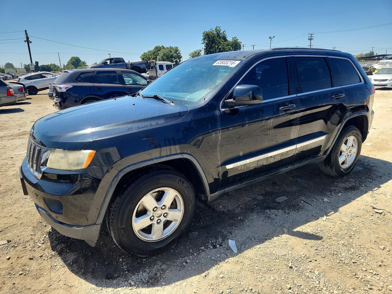 2013 Jeep Grand Cherokee Laredo, VIN 1C4RJEAG8DC574072 — Minor dents and scratches