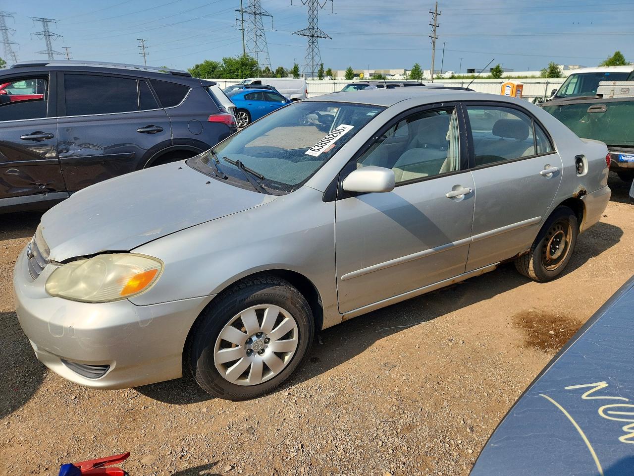 2004 Toyota Corolla LE, VIN 1NXBR38E24Z280384 — Front end