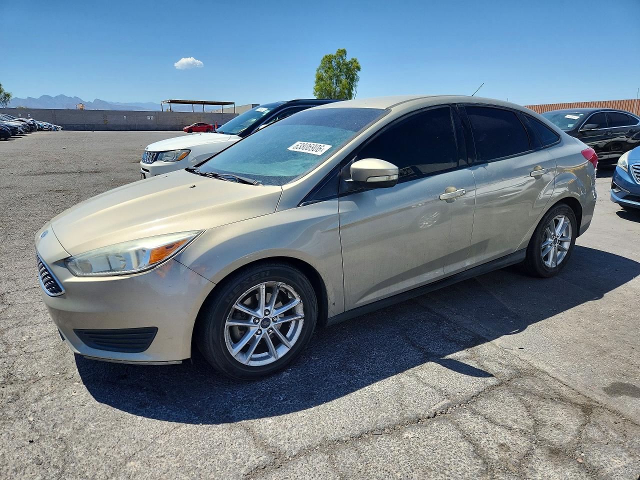 2015 Ford Focus SE, VIN 1FADP3F28FL204520 — Minor dents and scratches