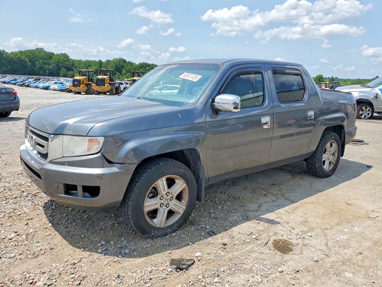 2011 Honda Ridgeline RTL, VIN 5FPYK1F51BB009324 — Normal wear