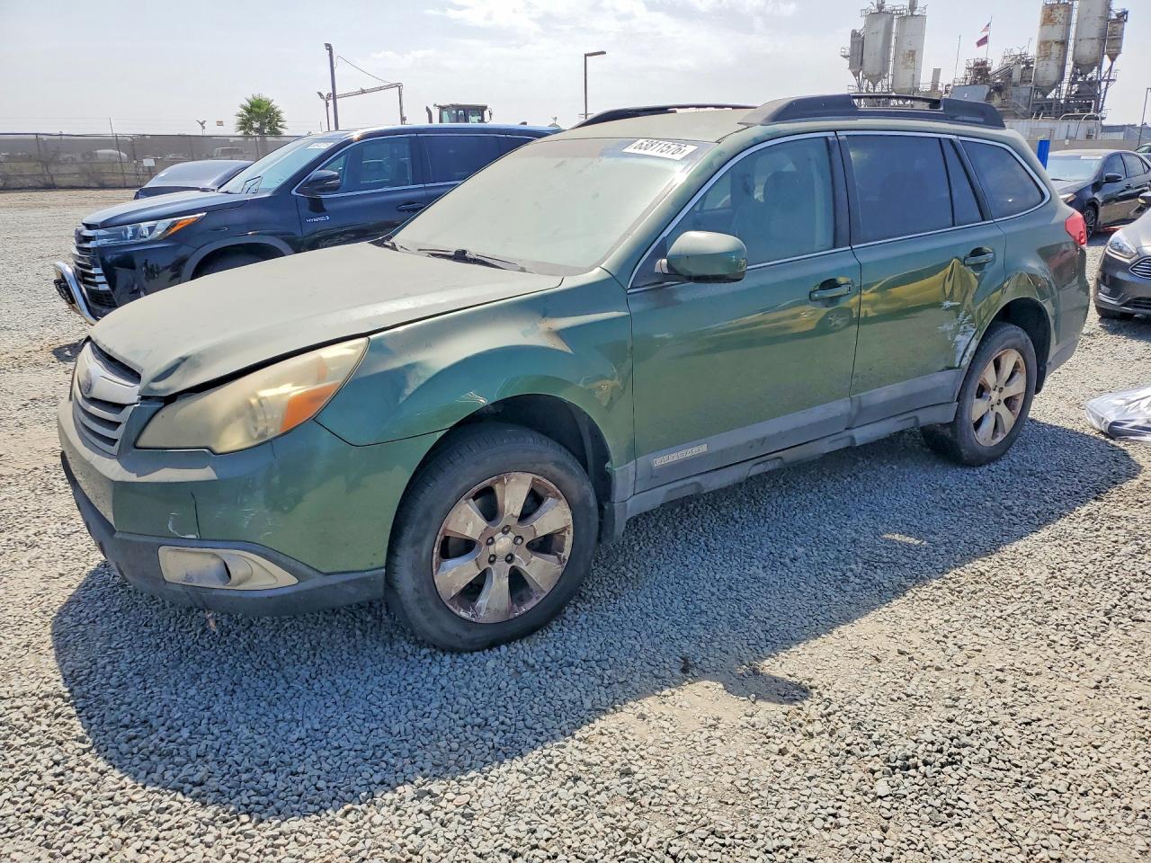 2011 Subaru Outback Premium, VIN 4S4BRCCC8B3370552 — Бок