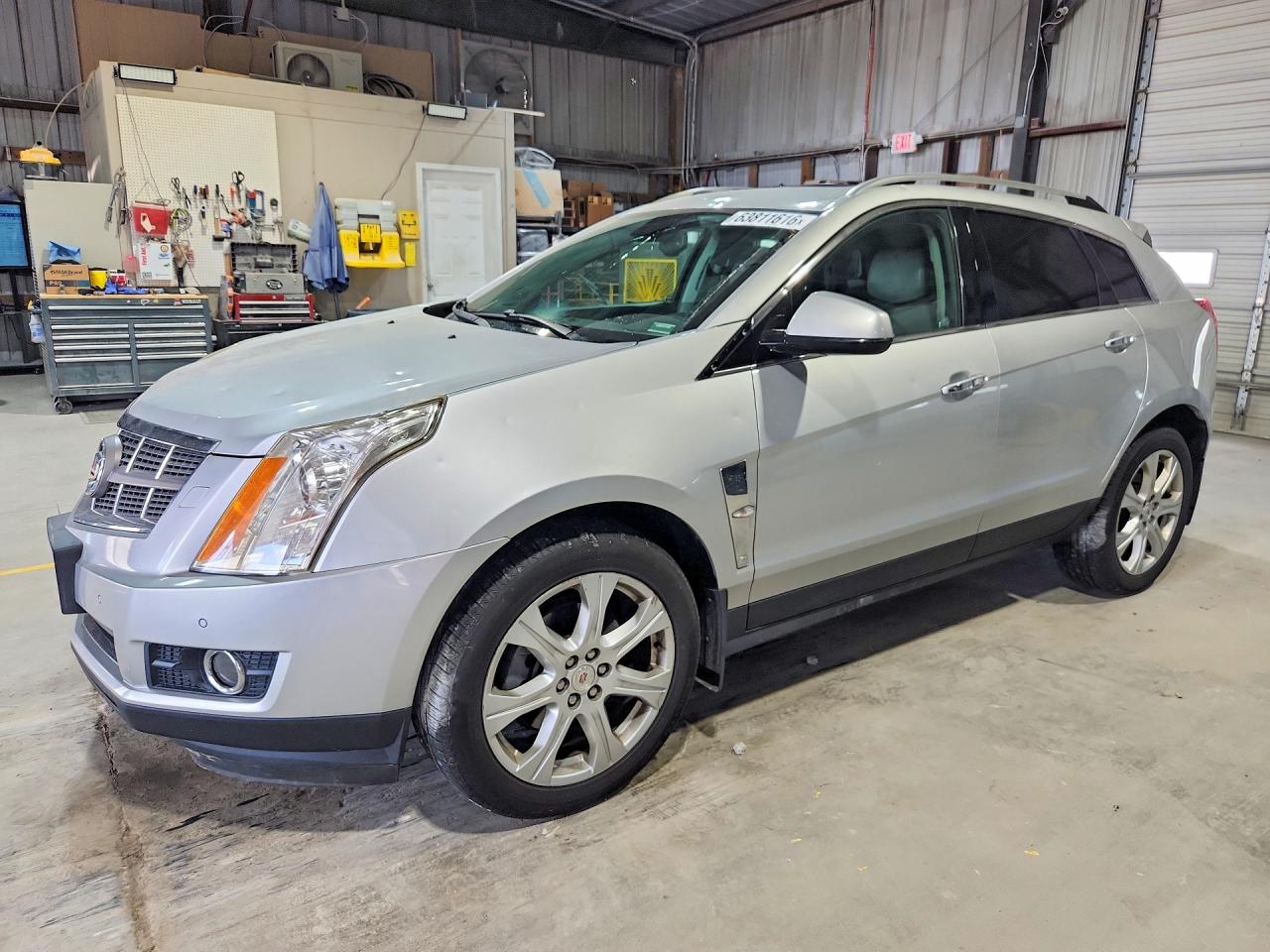 2011 Cadillac SRX Performance Collection, VIN 3GYFNBEY6BS572184 — Hail