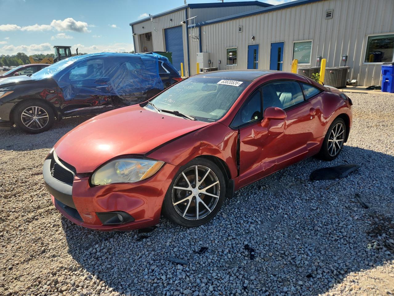 2011 Mitsubishi Eclipse GS, VIN 4A31K5DF6BE003997 — Side