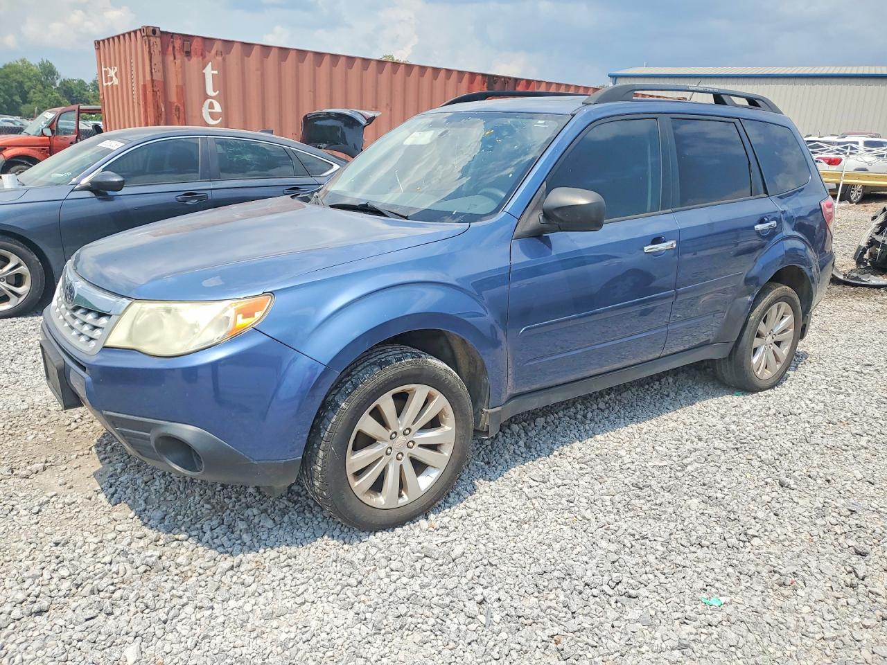 2012 Subaru Forester X Premium, VIN JF2SHADC0CH409120 — Side