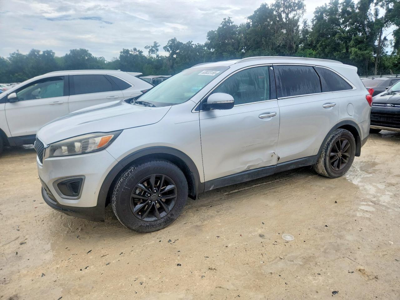 2016 Kia Sorento LX, VIN 5XYPG4A38GG096443 — Side