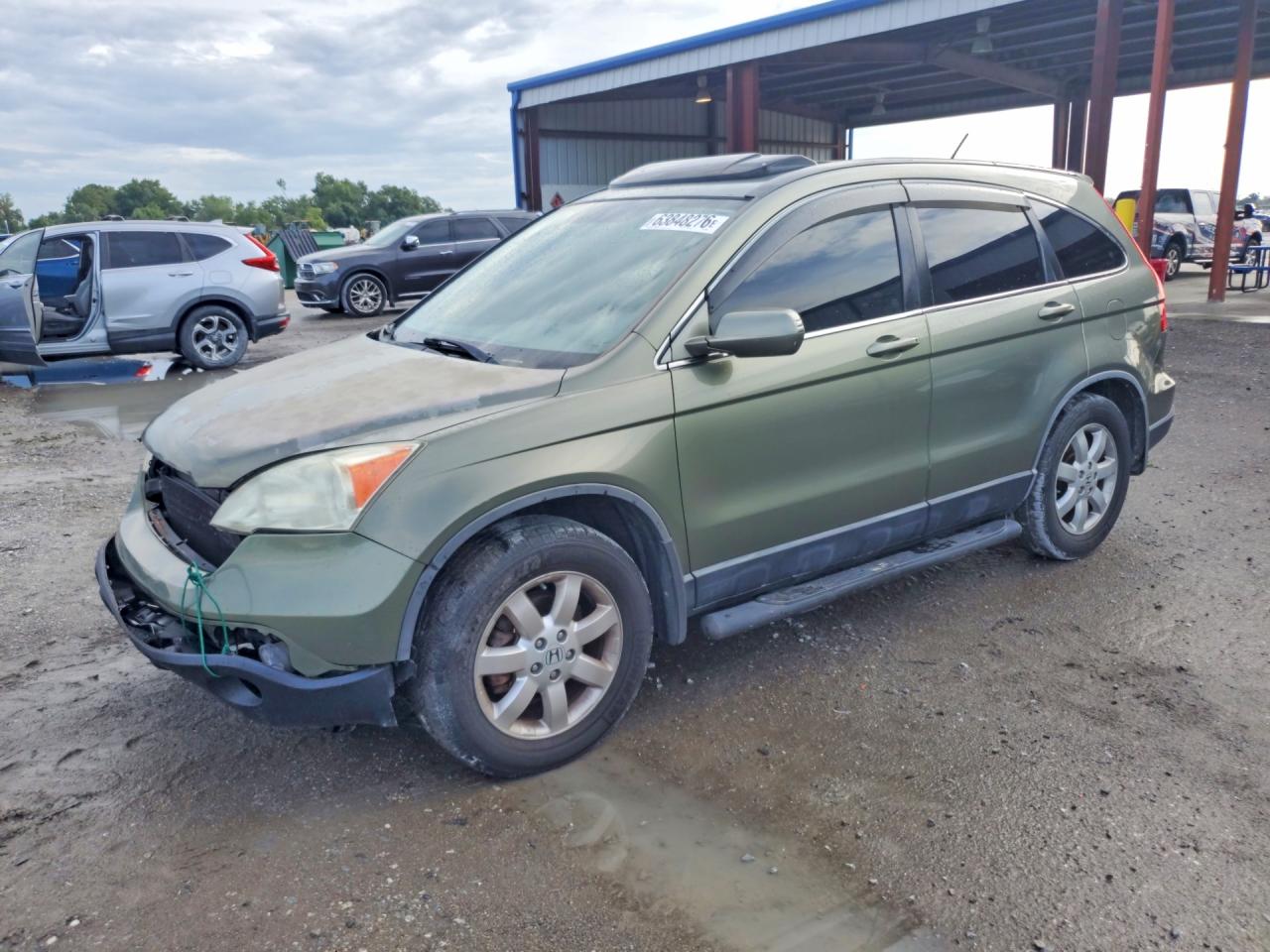 2007 Honda CR-V EX-L, VIN JHLRE48717C040021 — Перед