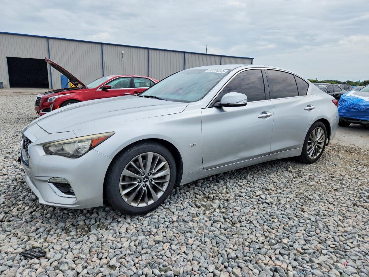 2019 Infiniti Q50 Signature Edition, VIN JN1EV7AP8KM511966 — Rear end