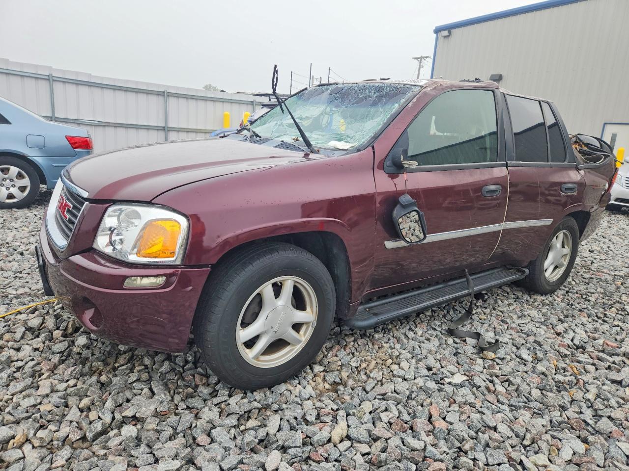 2007 GMC Envoy SLT, VIN 1GKDT13S372185773 — Зад