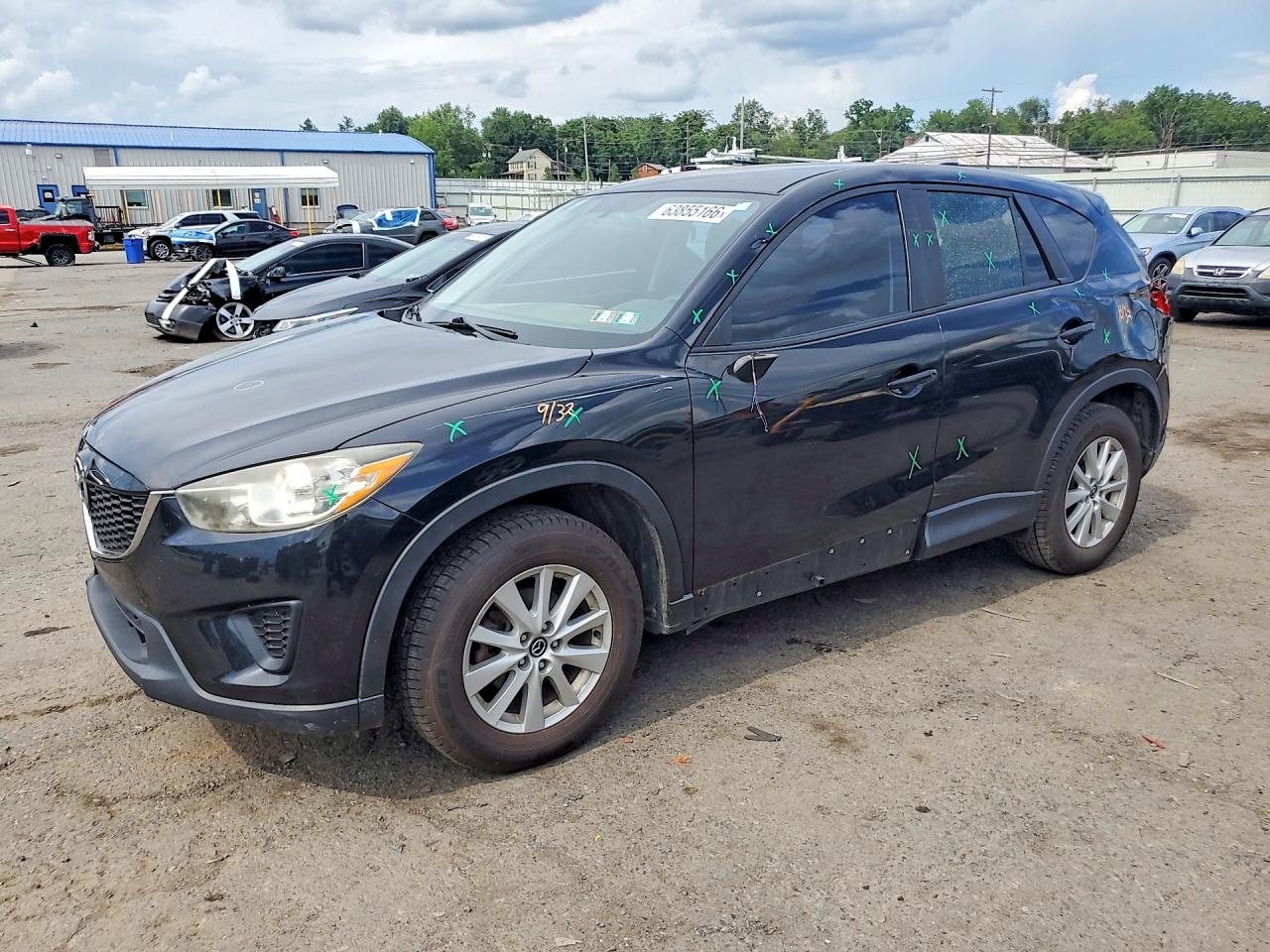 2013 Mazda CX-5 Sport, VIN JM3KE2BE1D0112513 — Side