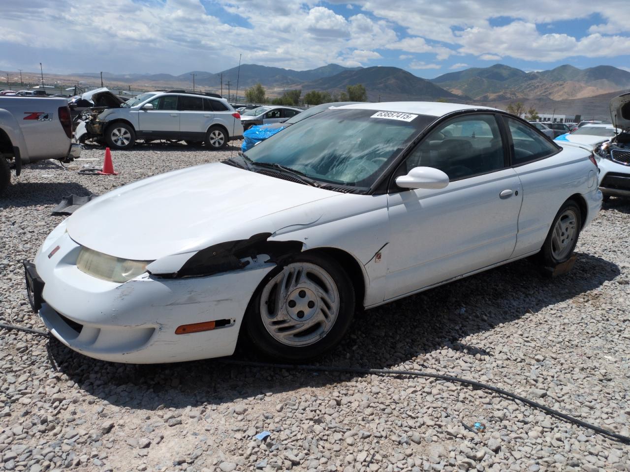 1997 Saturn SC, VIN 1G8ZG1273VZ138180 — Side