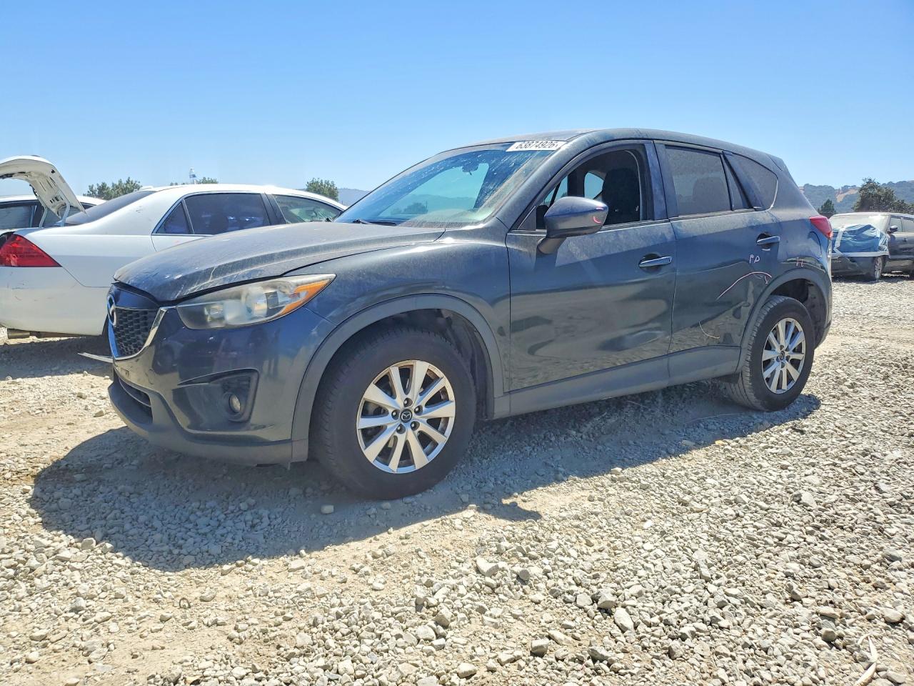 2013 Mazda CX-5 Touring, VIN JM3KE2CE1D0139919 — Front end