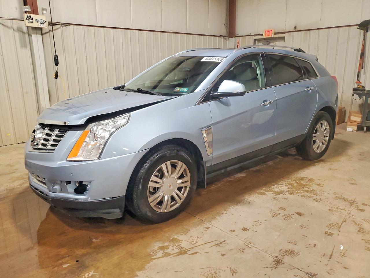2014 Cadillac SRX Luxury Collection, VIN 3GYFNEE34ES592587 — Бок