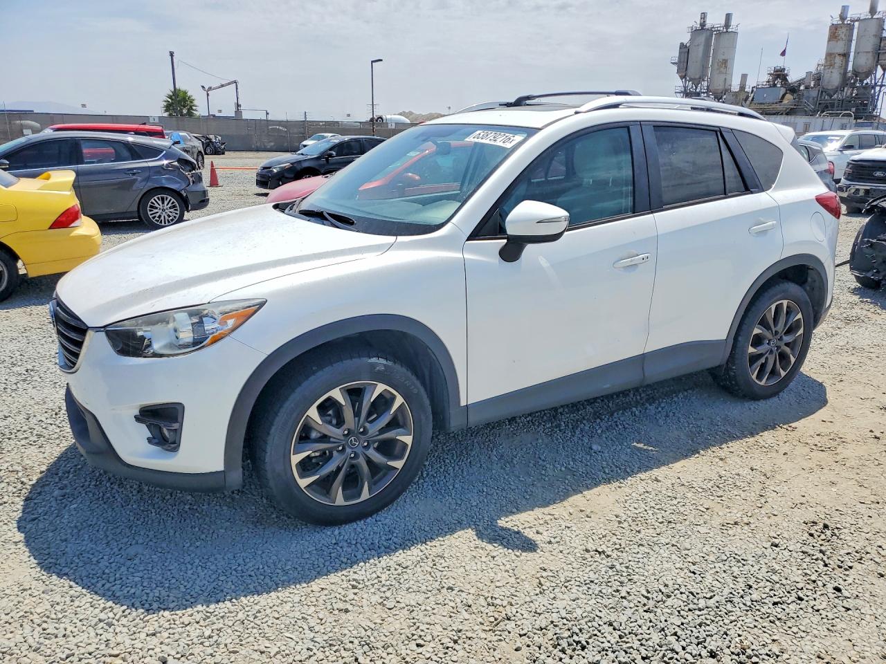 2016 Mazda CX-5 Grand Touring, VIN JM3KE2DY3G0706354 — Minor dents and scratches