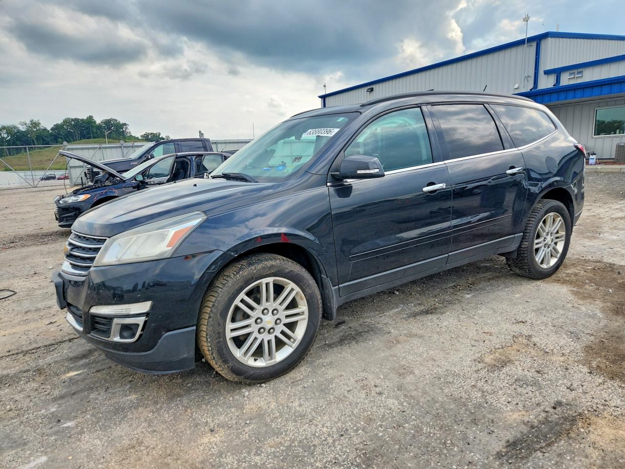 2014 Chevrolet Traverse LT, VIN 1GNKRGKD4EJ301497 — Side