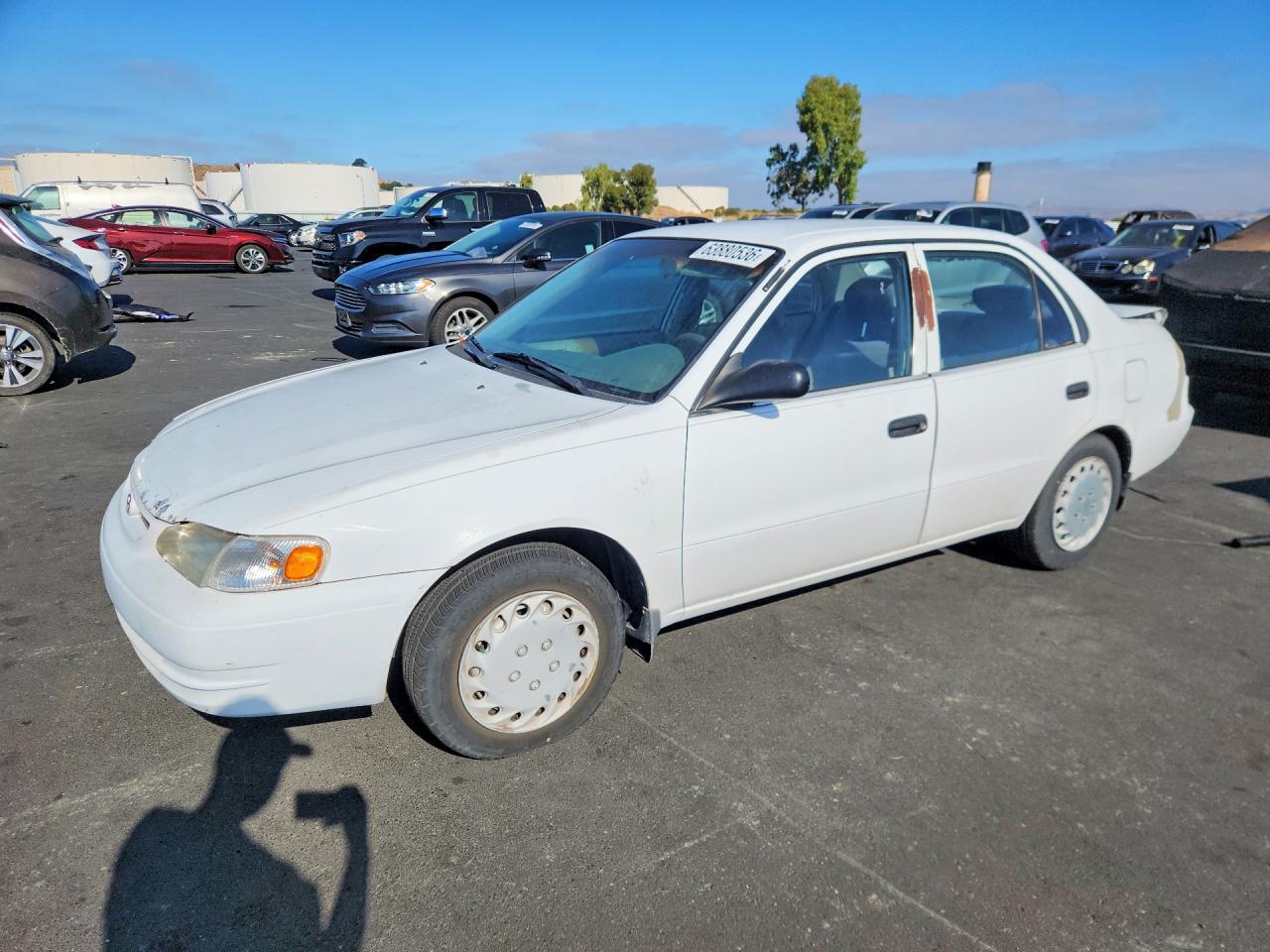 1999 Toyota Corolla CE, VIN 1NXBR12E4XZ142721 — Rear end