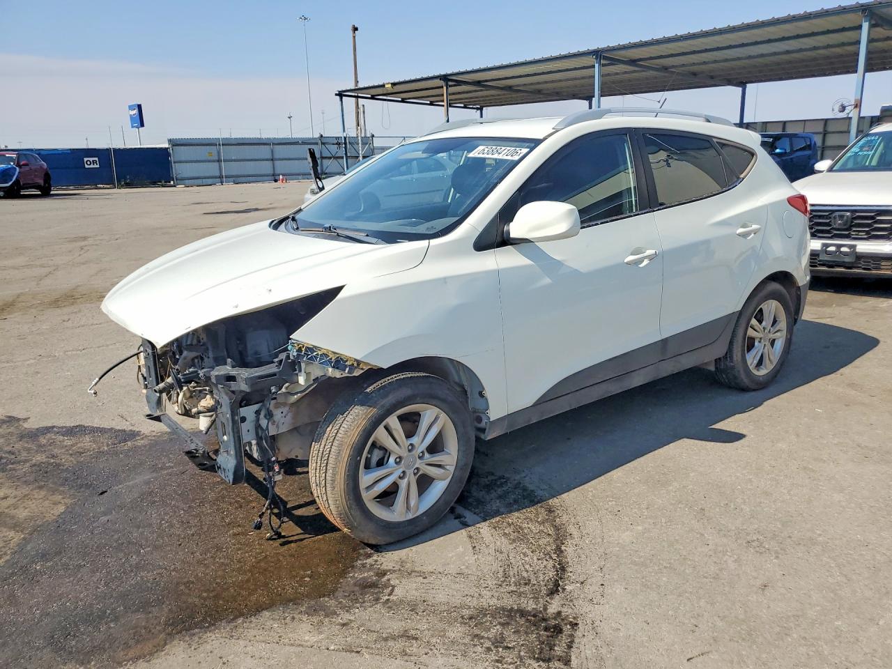 2010 Hyundai Tucson Limited, VIN KM8JU3AC9AU096395 — Front end
