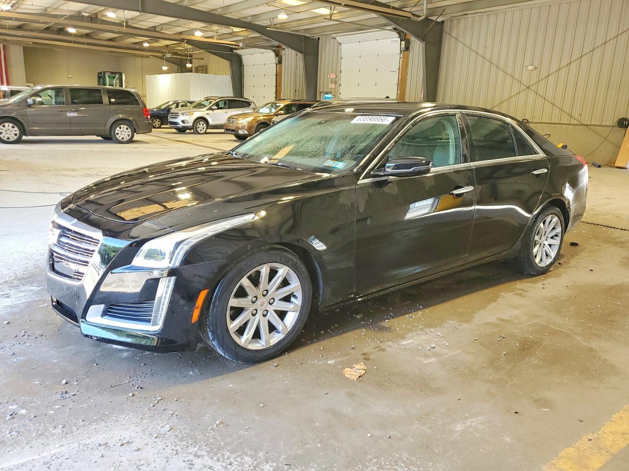 2015 Cadillac CTS RWD, VIN 1G6AP5SX6F0109243 — Обычный износ