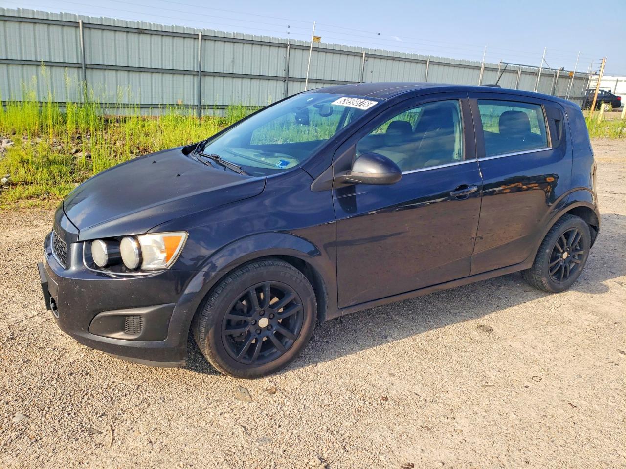 2015 Chevrolet Sonic LT, VIN 1G1JC6SH7F4137514 — Зад