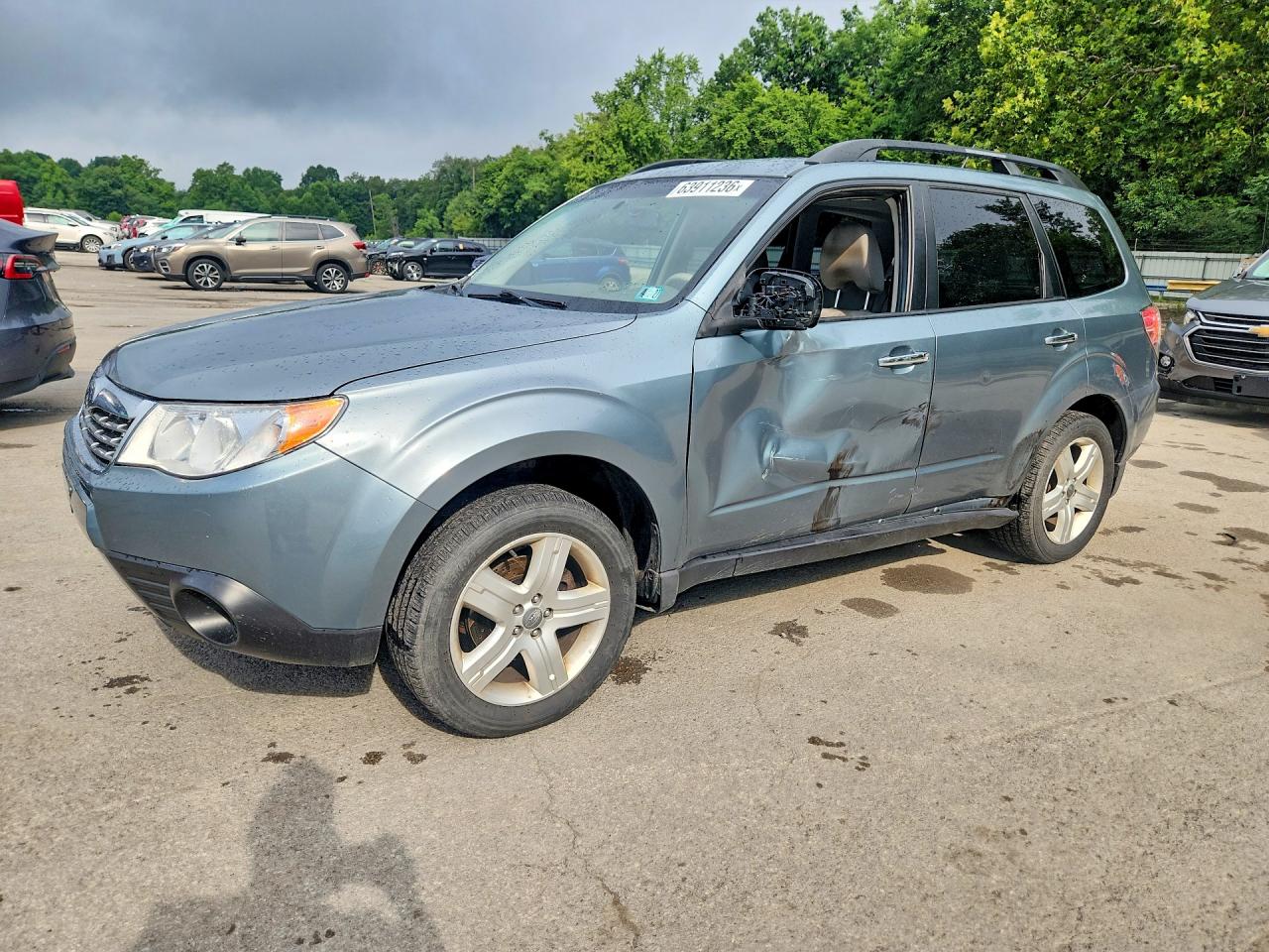 2010 Subaru Forester X Premium, VIN JF2SH6CC9AH749653 — Side