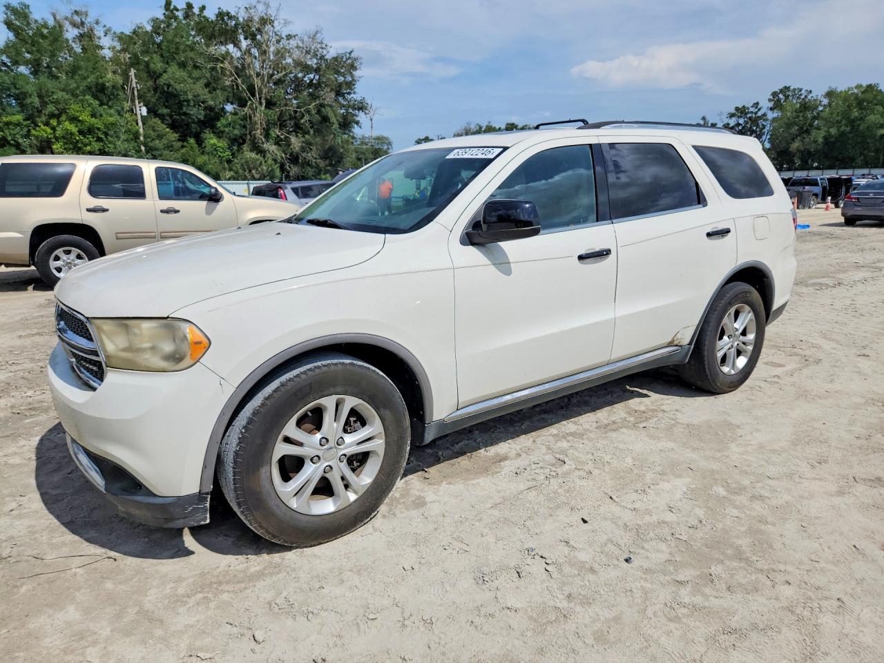 2011 Dodge Durango Express, VIN 1D4RD2GG7BC717011 — Side