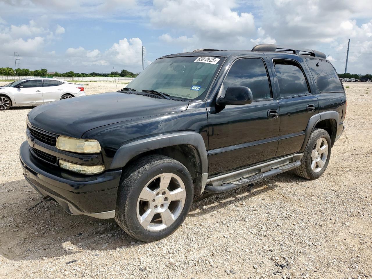 2001 Chevrolet Tahoe LT, VIN 1GNEK13T61R221196 — Hail