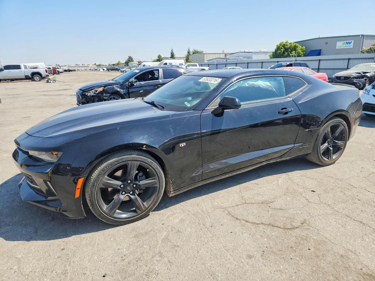 2016 Chevrolet Camaro 1LT, VIN 1G1FB1RX2G0167649 — Side