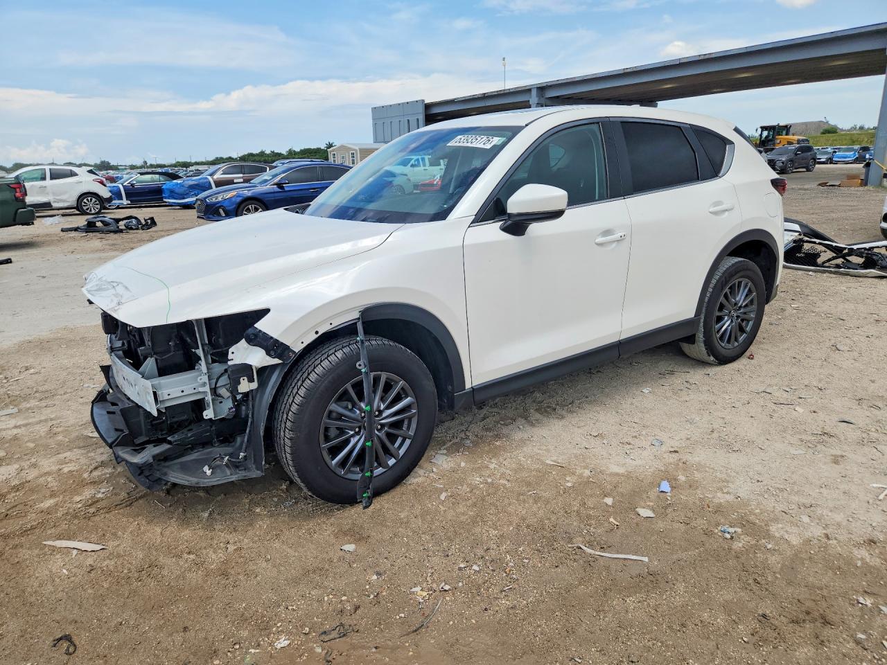 2020 Mazda CX-5 Touring, VIN JM3KFACM2L1864145 — Перед