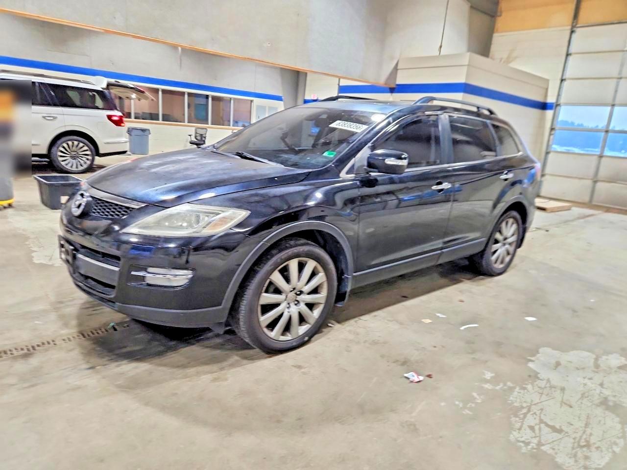 2009 Mazda CX-9 Grand Touring, VIN JM3TB28A690175583 — Side